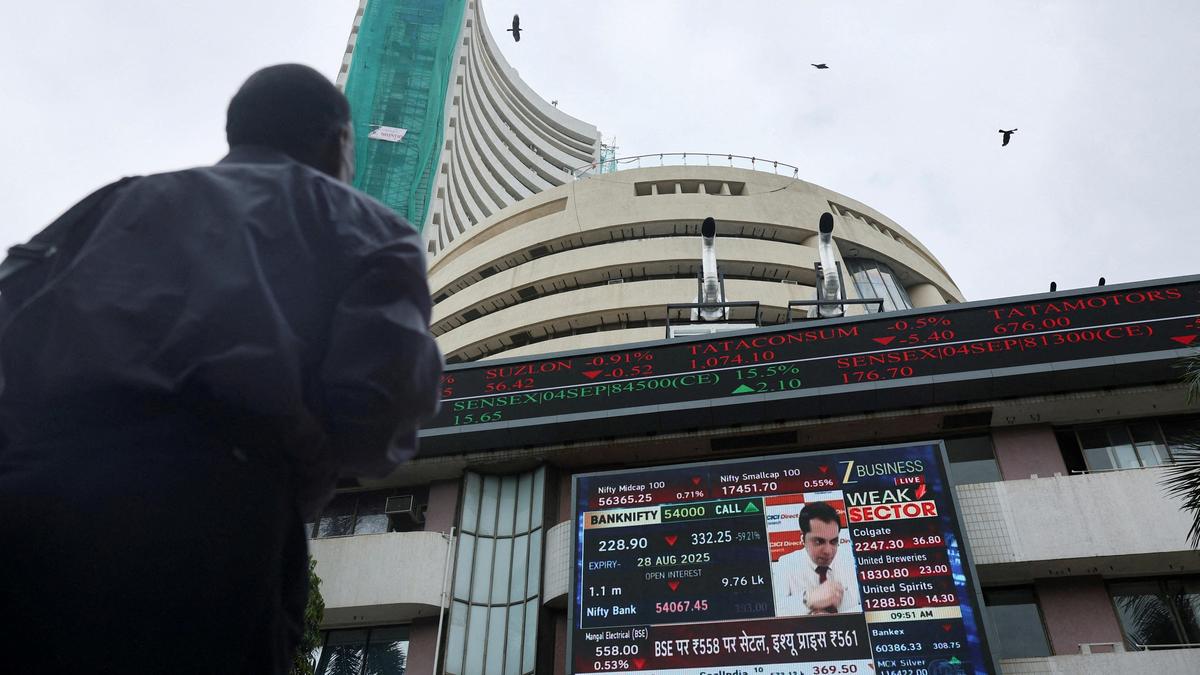 Stock markets trade flat amid volatile trends