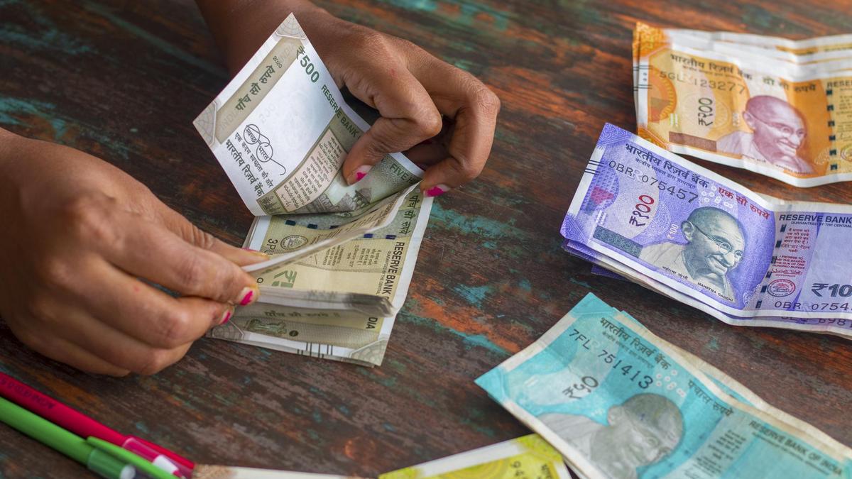 Rupee declines 10 paise to 90.44 against U.S. dollar in early trade