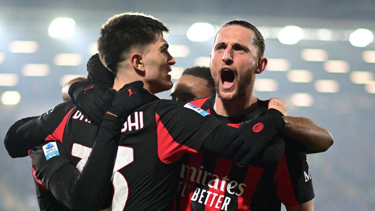 Rabiot double lifts Milan after early scare at Como