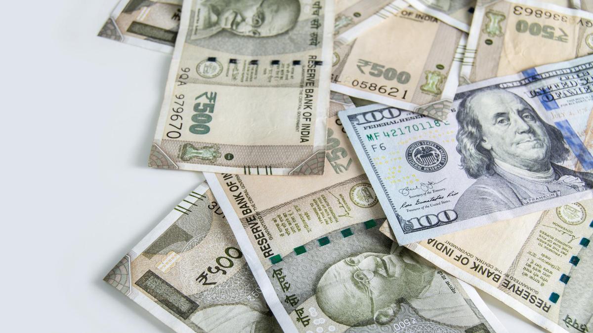 Rupee falls 7 paise to settle at record low of 90.97 against U.S. dollar