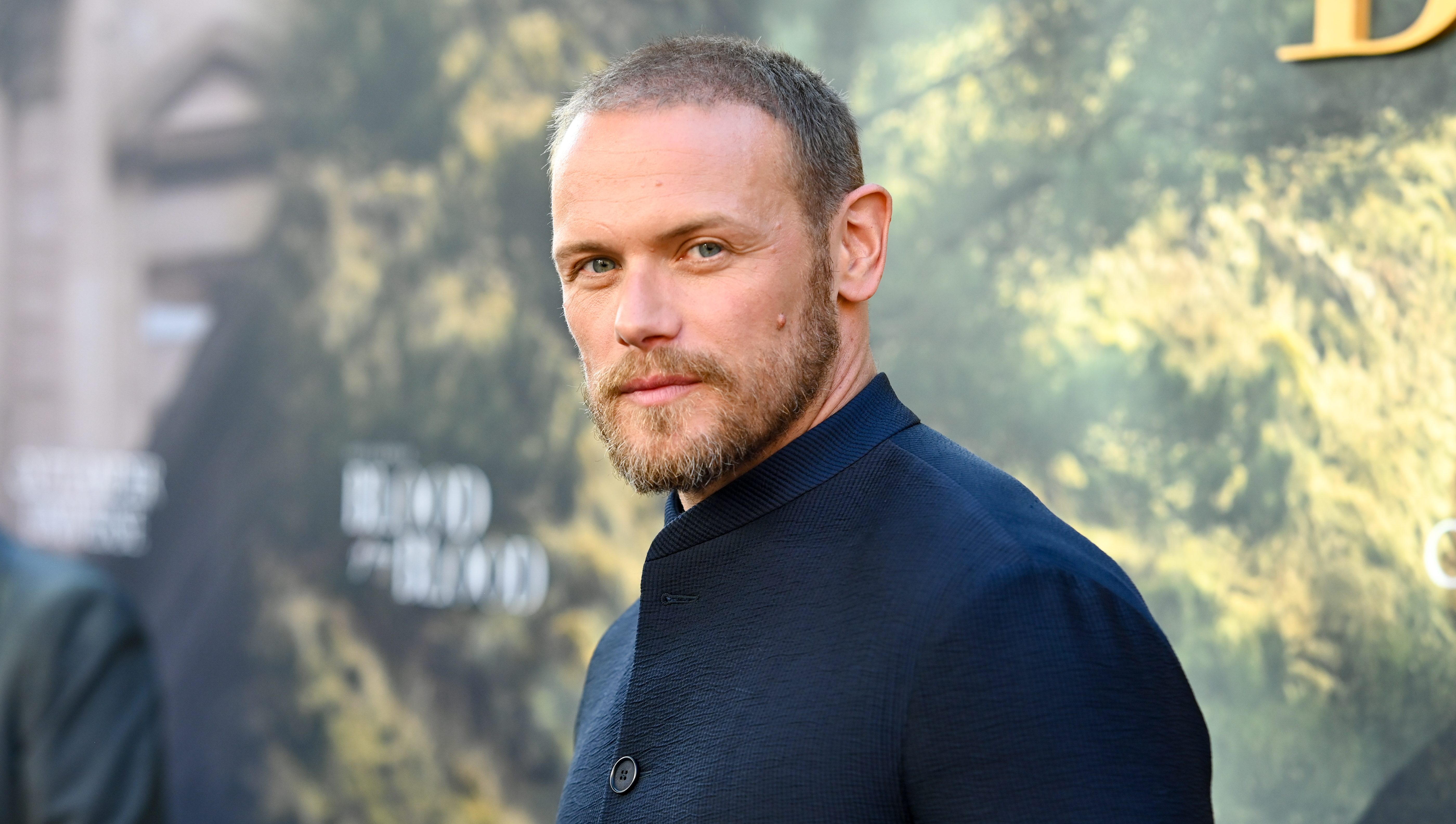 Sam Heughan Joins Anna Kendrick & J.K. Simmons In ‘Embassy’