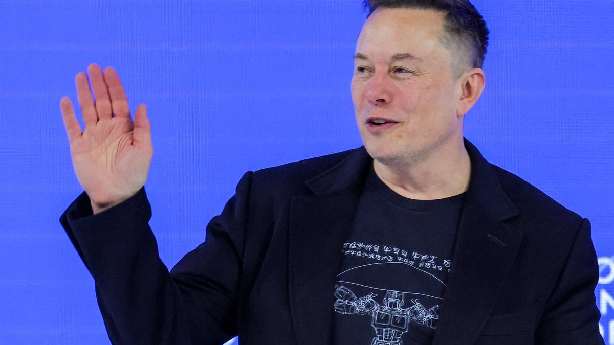 Elon Musk makes Davos debut with promise of robots for all